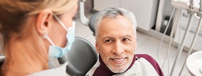 Chaska patient discussing denture options