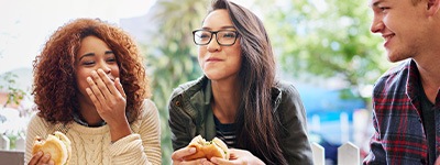 Group of teens eating lunch together