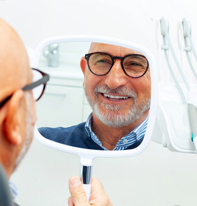 a dental implant patient smiling