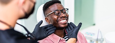 Patient holding clear aligner