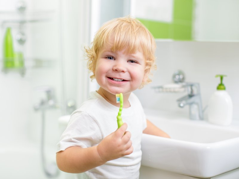 child enjoying brushing their teeth in Chaska
