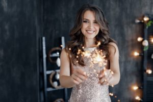 a woman with a healthy smile in the New Year