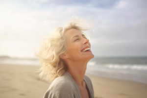 a person smiling while visiting a beach